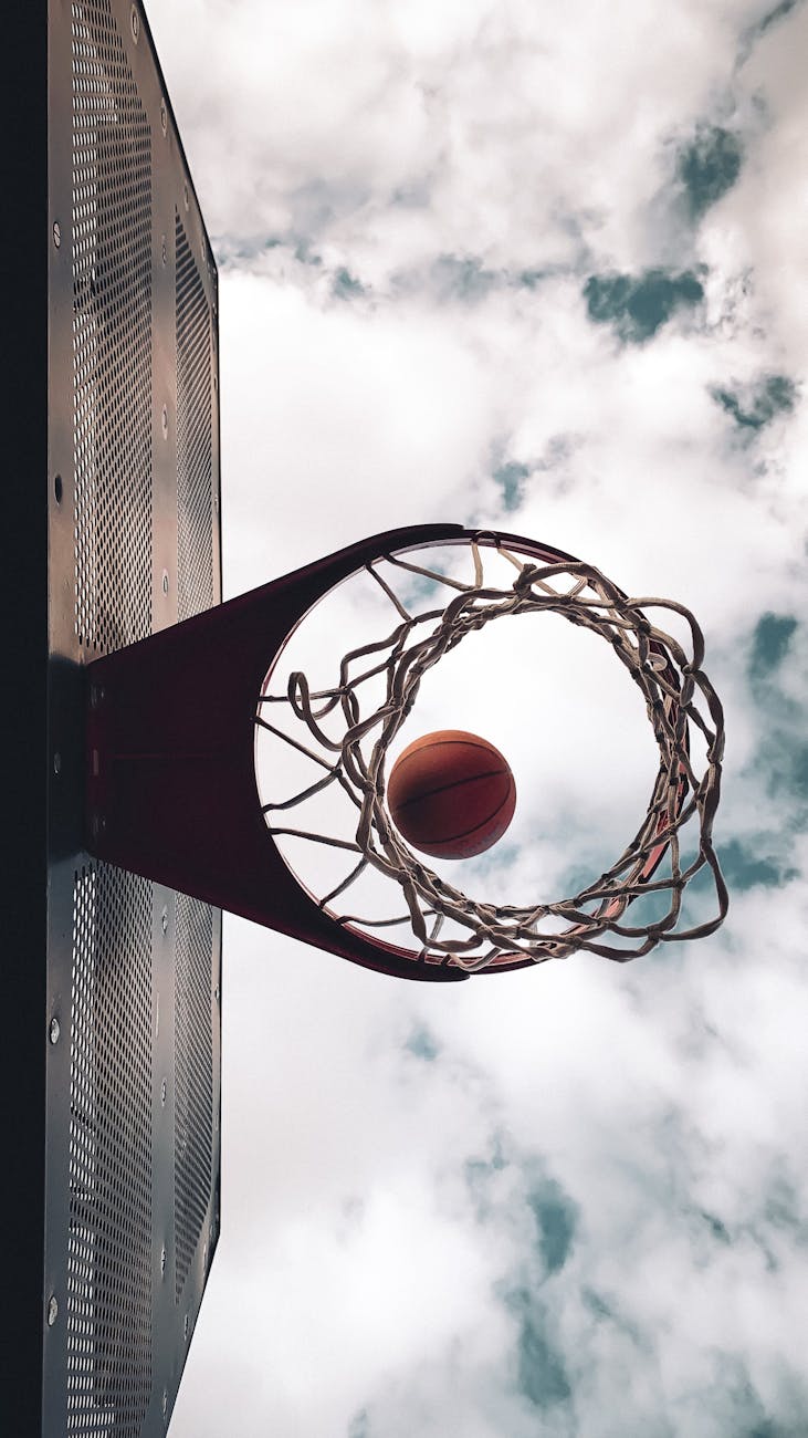 basketball ball over ring